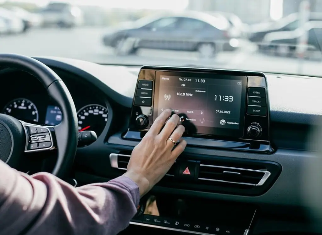 https://www.checkatrade.com/blog/wp-content/uploads/2025/03/changing-channel-on-new-car-stereo-1024x748.jpeg