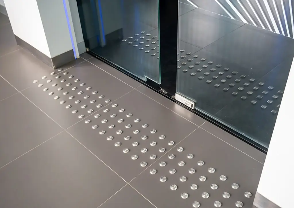 Studded non slip flooring plate
