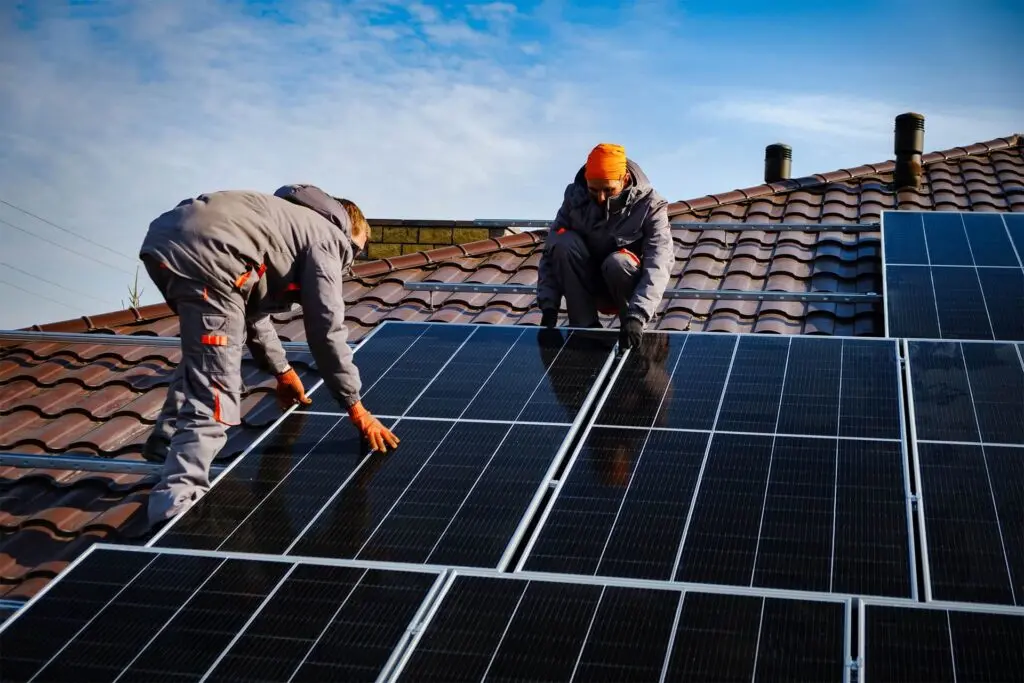 https://www.checkatrade.com/blog/wp-content/uploads/2024/11/how-to-grow-a-solar-panel-business-roof-1024x683.jpg