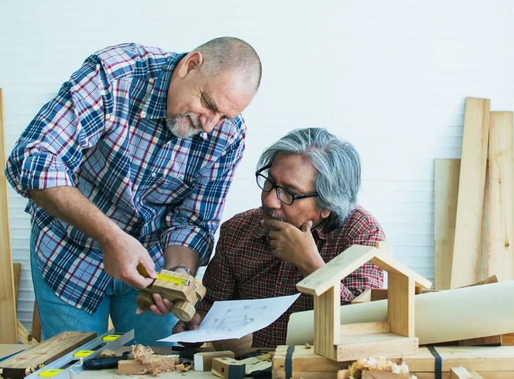 https://www.checkatrade.com/blog/wp-content/uploads/2021/11/middle-aged-carpenters-1024x754.jpeg