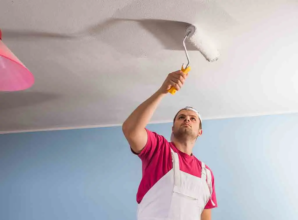 Paint a ceiling with a roller