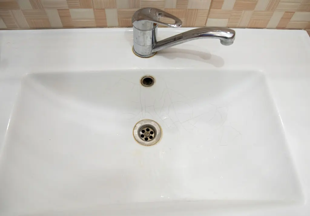 Cracked crazing bathroom basin sink