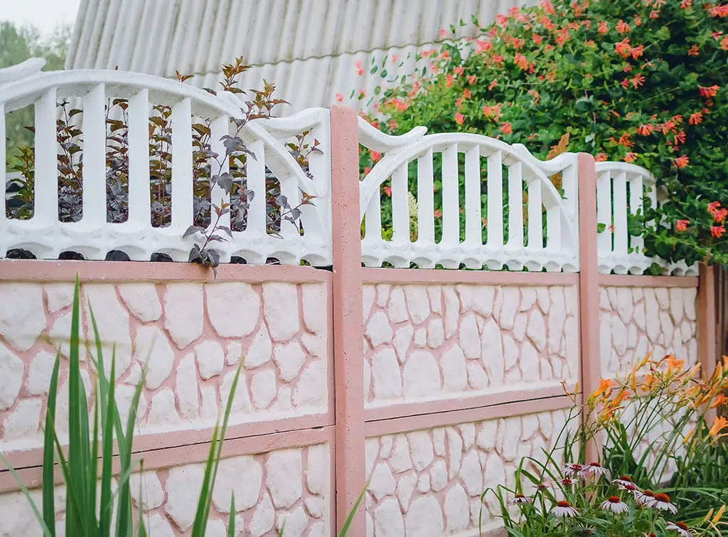 https://www.checkatrade.com/blog/wp-content/uploads/2023/07/Concrete-fence-paint-colour_.jpg