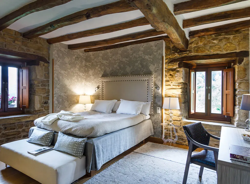 Embracing original materials in country bedrooms