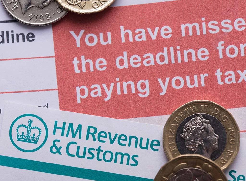 https://www.checkatrade.com/blog/wp-content/uploads/2024/02/paying-self-assessment-tax-on-time.jpg