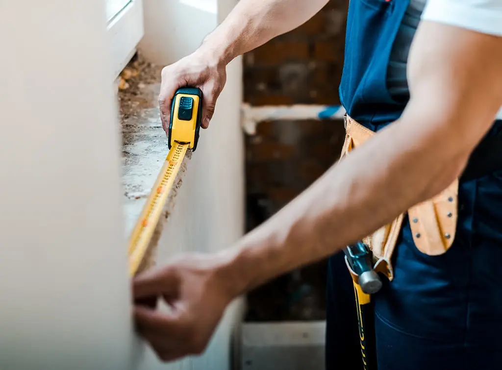 https://www.checkatrade.com/blog/wp-content/uploads/2023/09/checking-window-installation.jpg