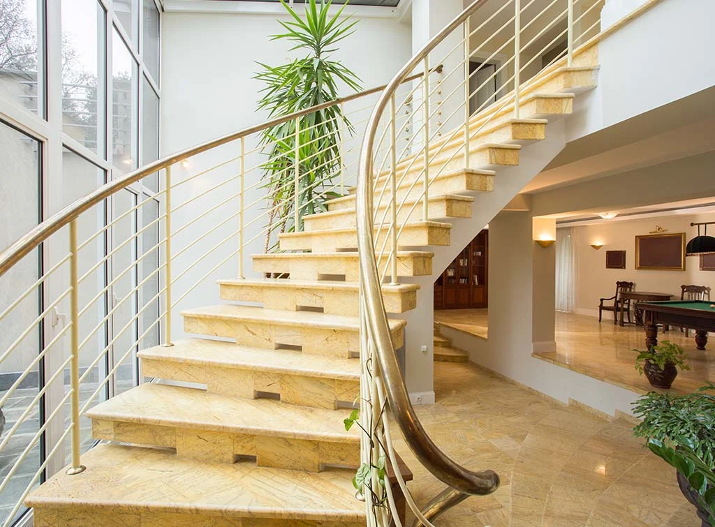 sweeping marble staircase
