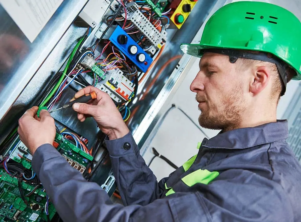 https://www.checkatrade.com/blog/wp-content/uploads/2024/03/commercial-electrician-specialist-work.jpg