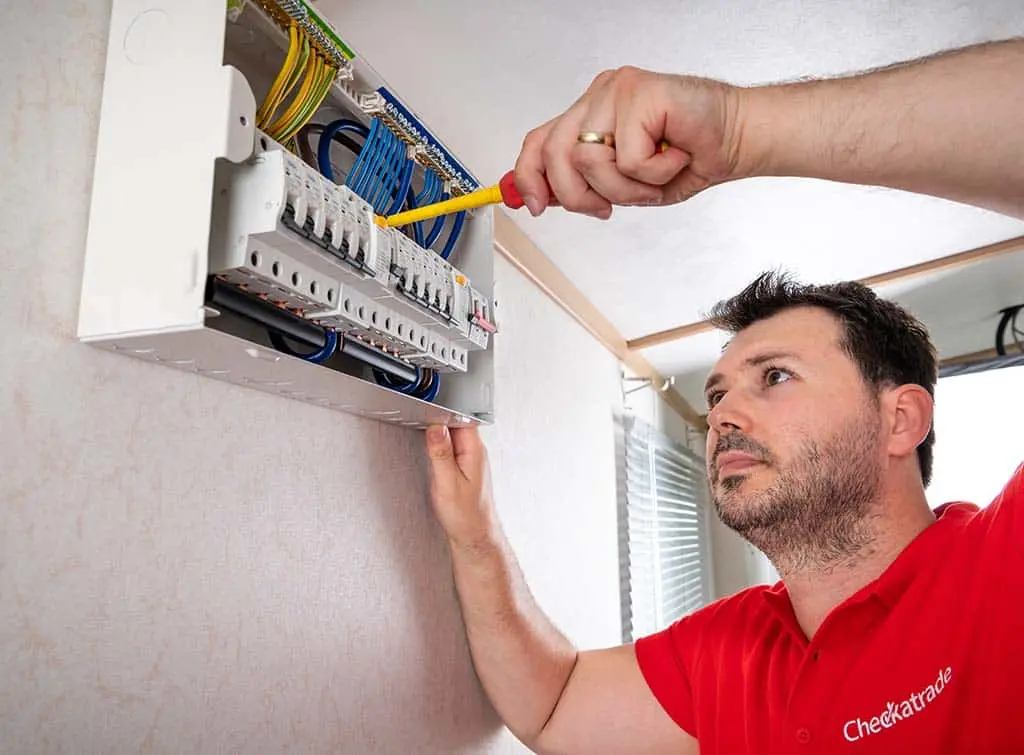 electrician with fuse box