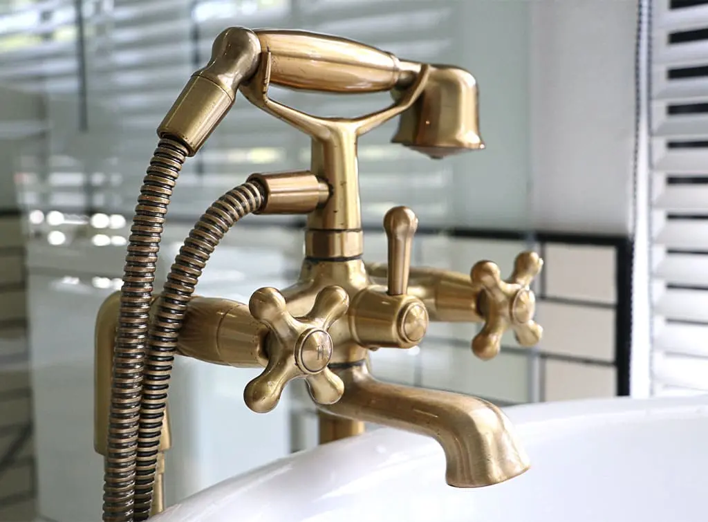 Antique mixer taps in a bathroom