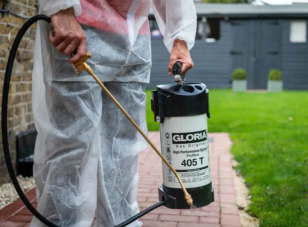 https://www.checkatrade.com/blog/wp-content/uploads/2024/12/spraying-to-deal-with-garden-pests.jpg