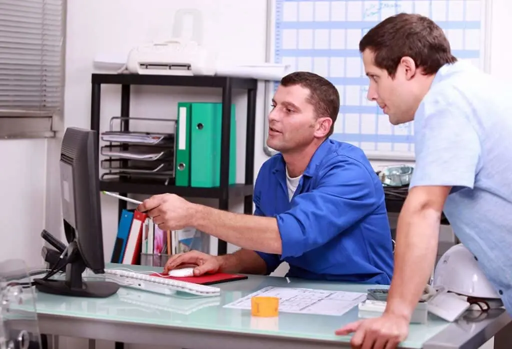 https://www.checkatrade.com/blog/wp-content/uploads/2023/04/discussing-outsourced-work-with-subcontractor-1024x698.jpeg