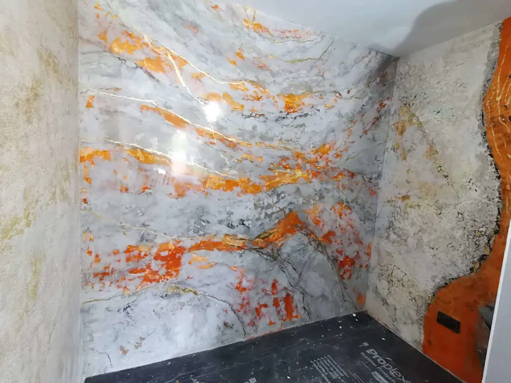 Limewash marble effect wall