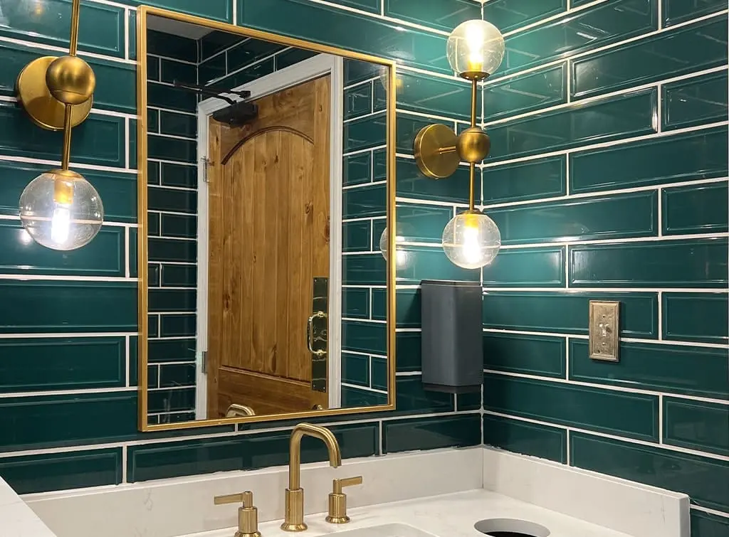 Bathroom wall tiles in dark emerald green