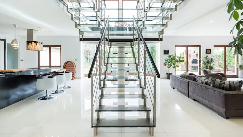 Glass stair panels in beautiful modern home design