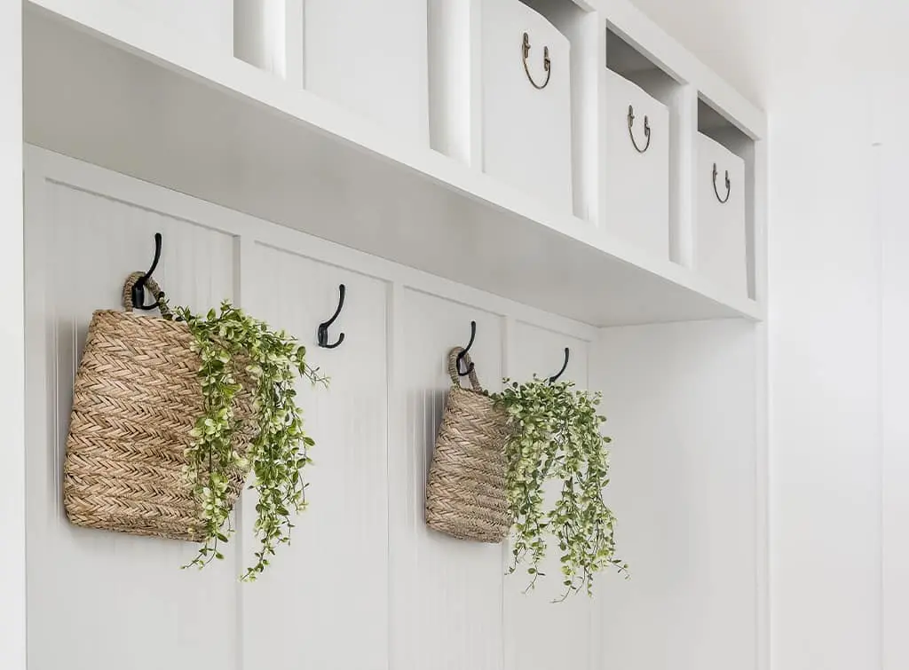 white wall panelling in a cloakroom