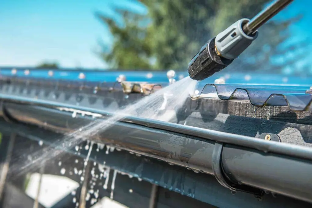 Gutters being cleaned