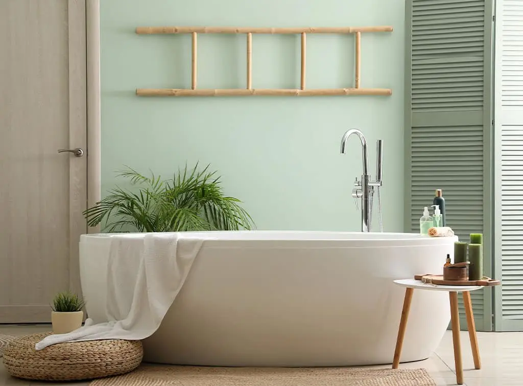 Green bathroom with wood