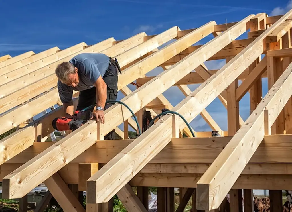 Truss roof being put up by roofer