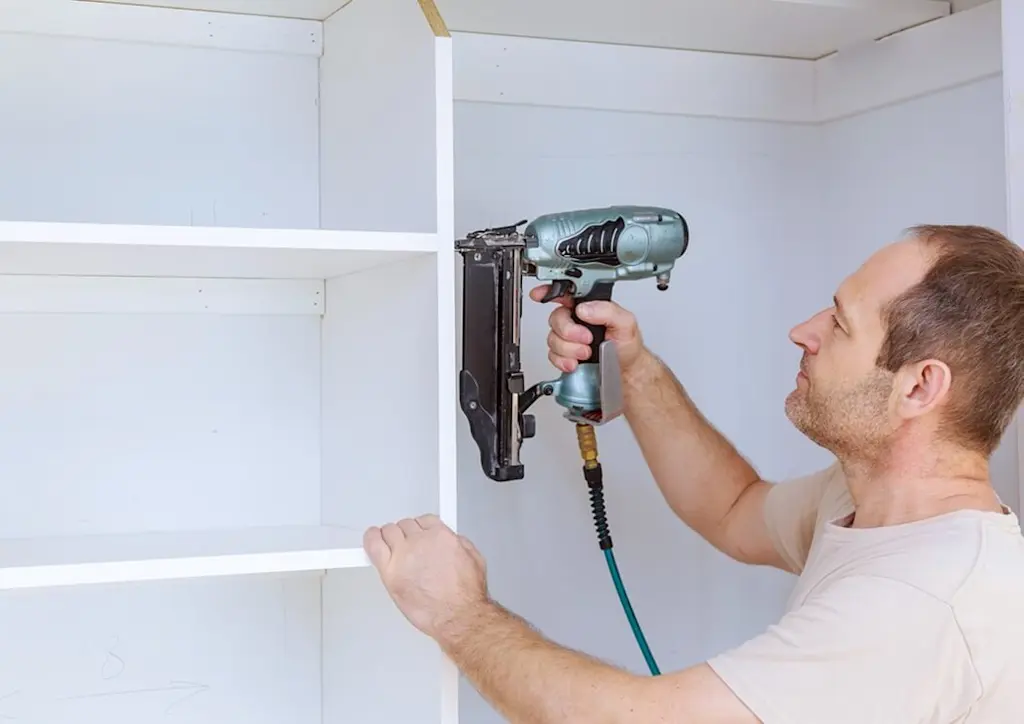 Installing shelving units for shop