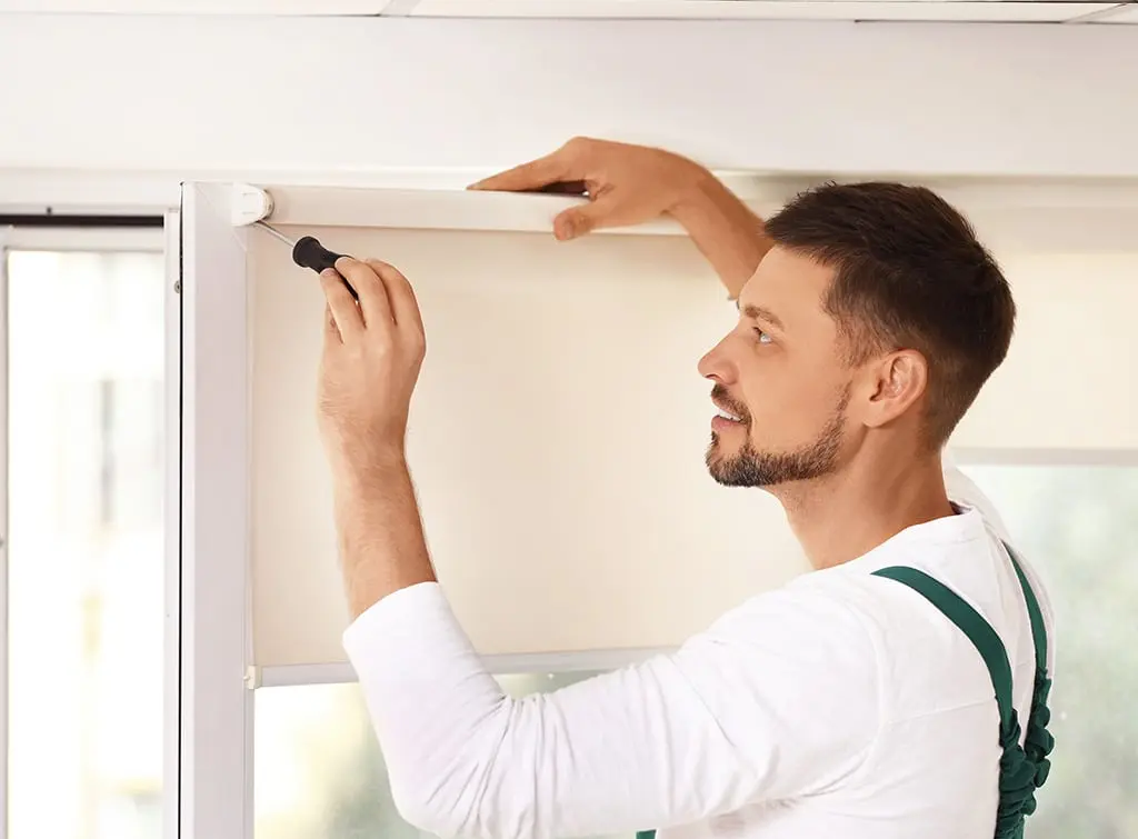 https://www.checkatrade.com/blog/wp-content/uploads/2022/09/installing-blinds.jpg