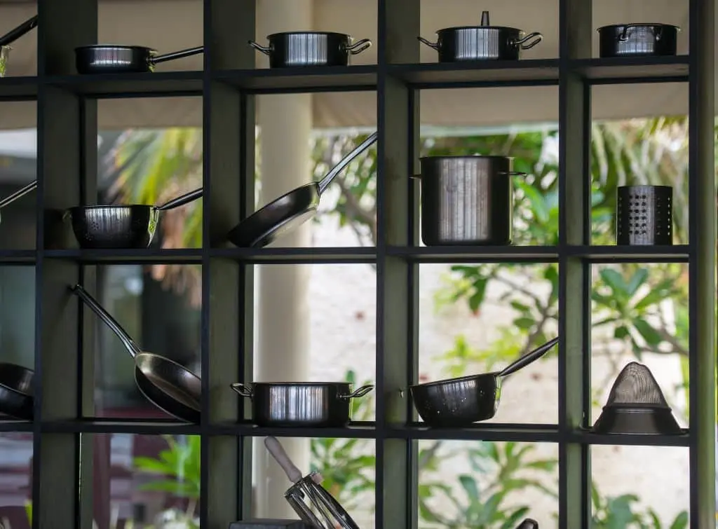 Industrial style kitchen accessories on slatted shelving unit