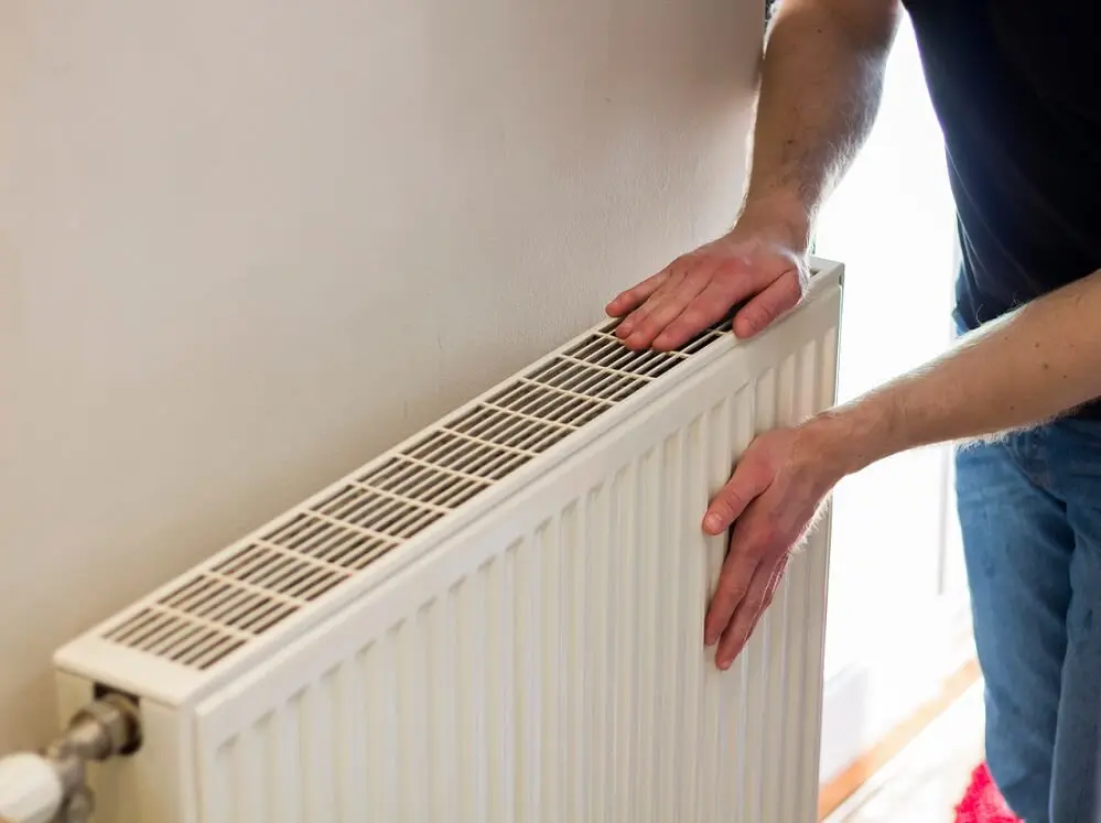 https://www.checkatrade.com/blog/wp-content/uploads/2024/11/radiator-not-warm-due-to-boiler-error-1.jpeg