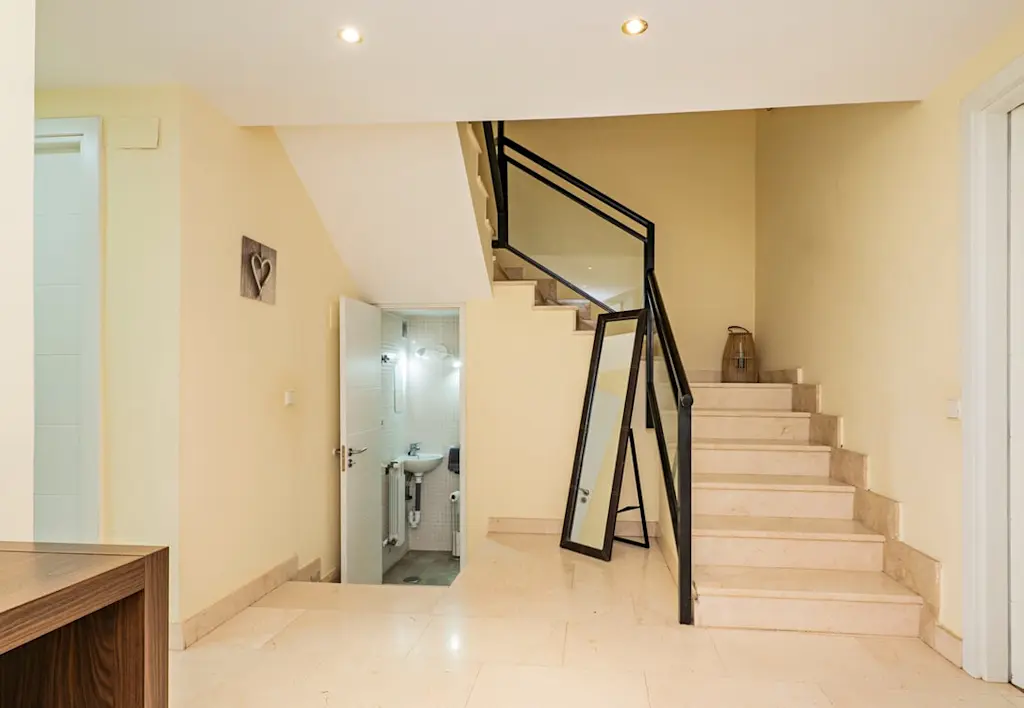 Small bathroom under stairs