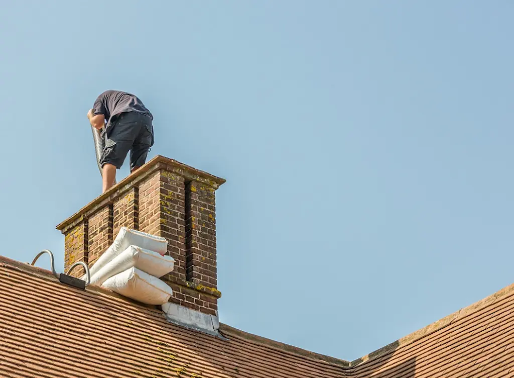 Chimney lining roofer