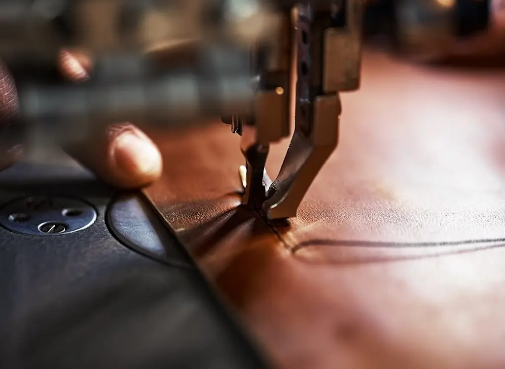 tradespeople carrying out leather restoration
