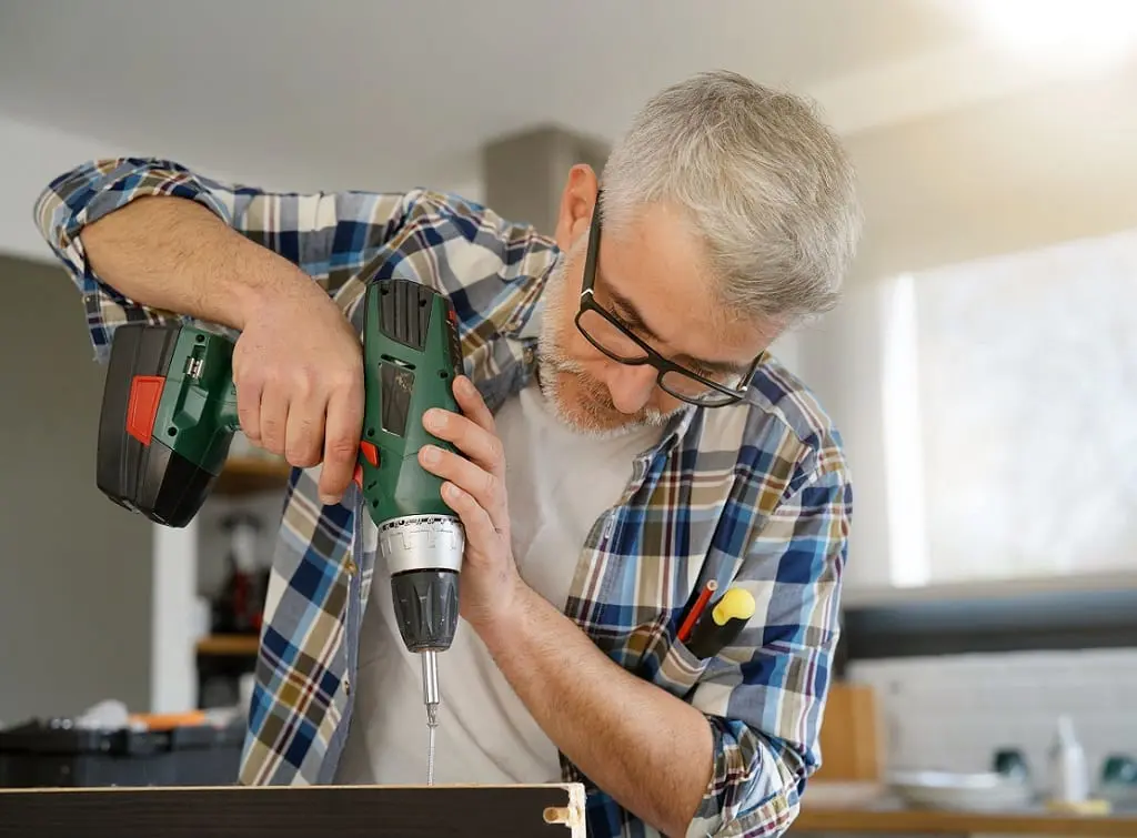 https://www.checkatrade.com/blog/wp-content/uploads/2024/08/skills-of-a-handyman-being-used.jpeg