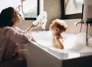 https://www.checkatrade.com/blog/wp-content/uploads/2021/04/shower-vs-bath-water-usage-300x221.jpg