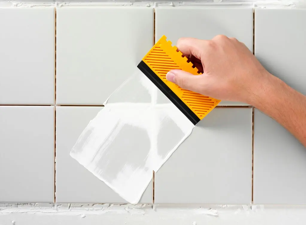 Applying grout diagonally