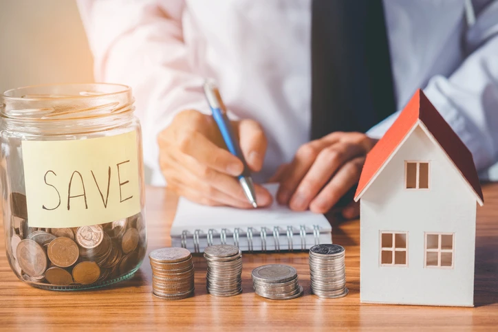 Save money for home cost concept
