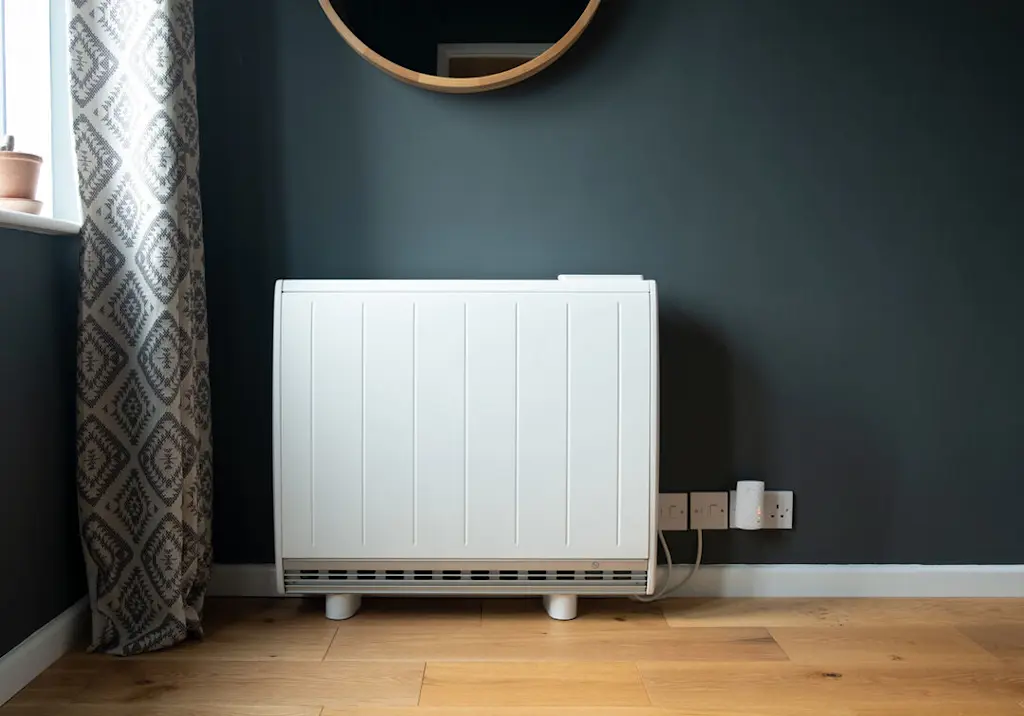 white-storage-heater-bedroom-wall
