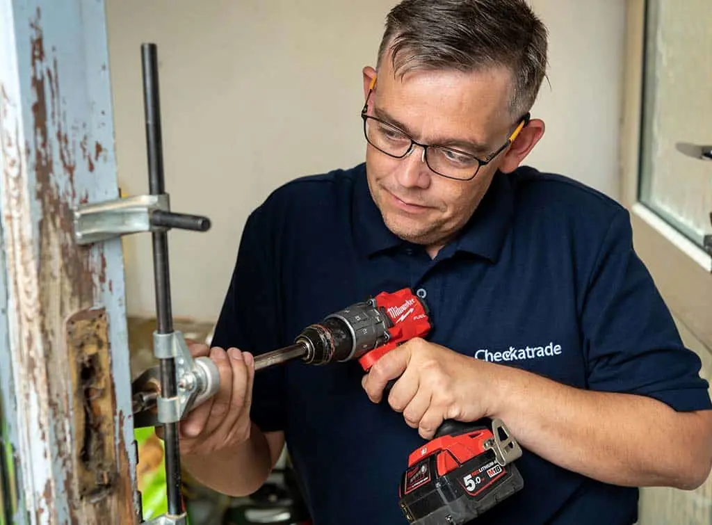 https://www.checkatrade.com/blog/wp-content/uploads/2024/10/checkatrade-member-locksmith.jpg