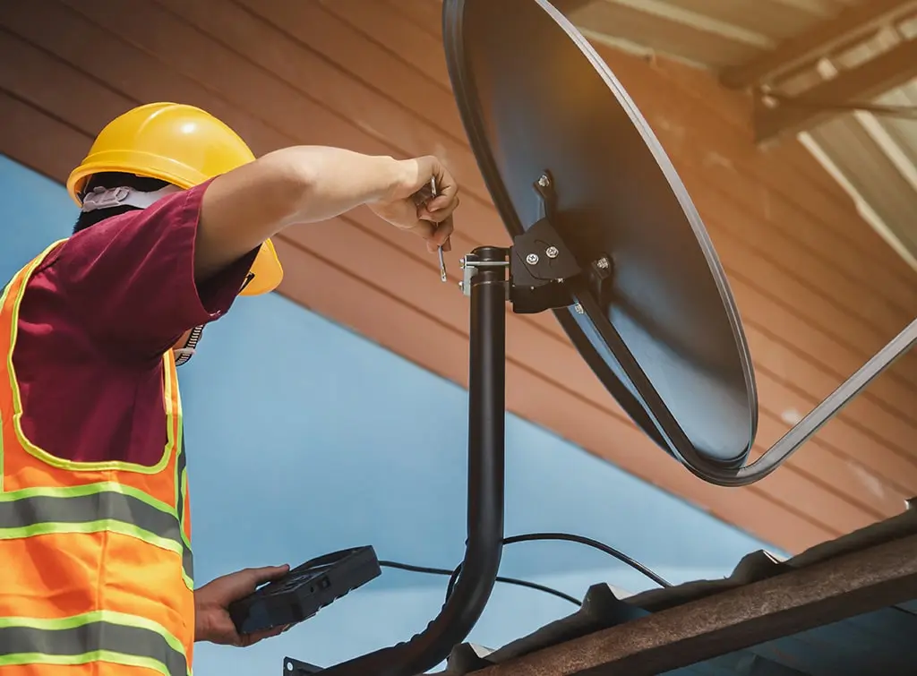https://www.checkatrade.com/blog/wp-content/uploads/2021/09/tradesperson-Satellite-Installation.jpg