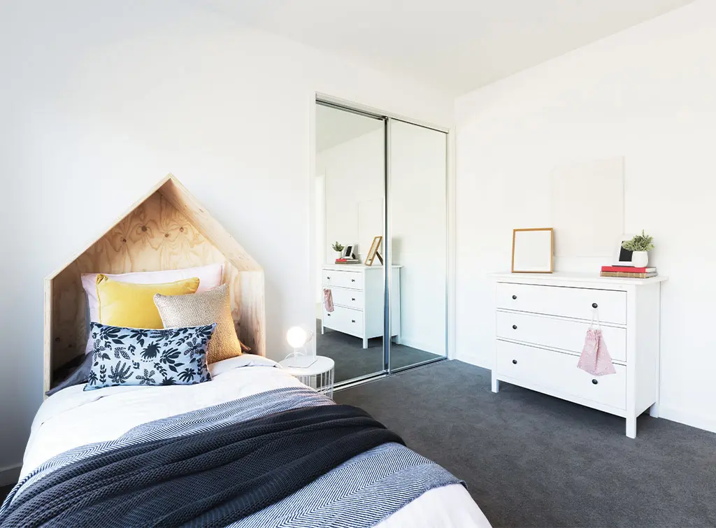utilise an alcove for built in wardrobes in small rooms