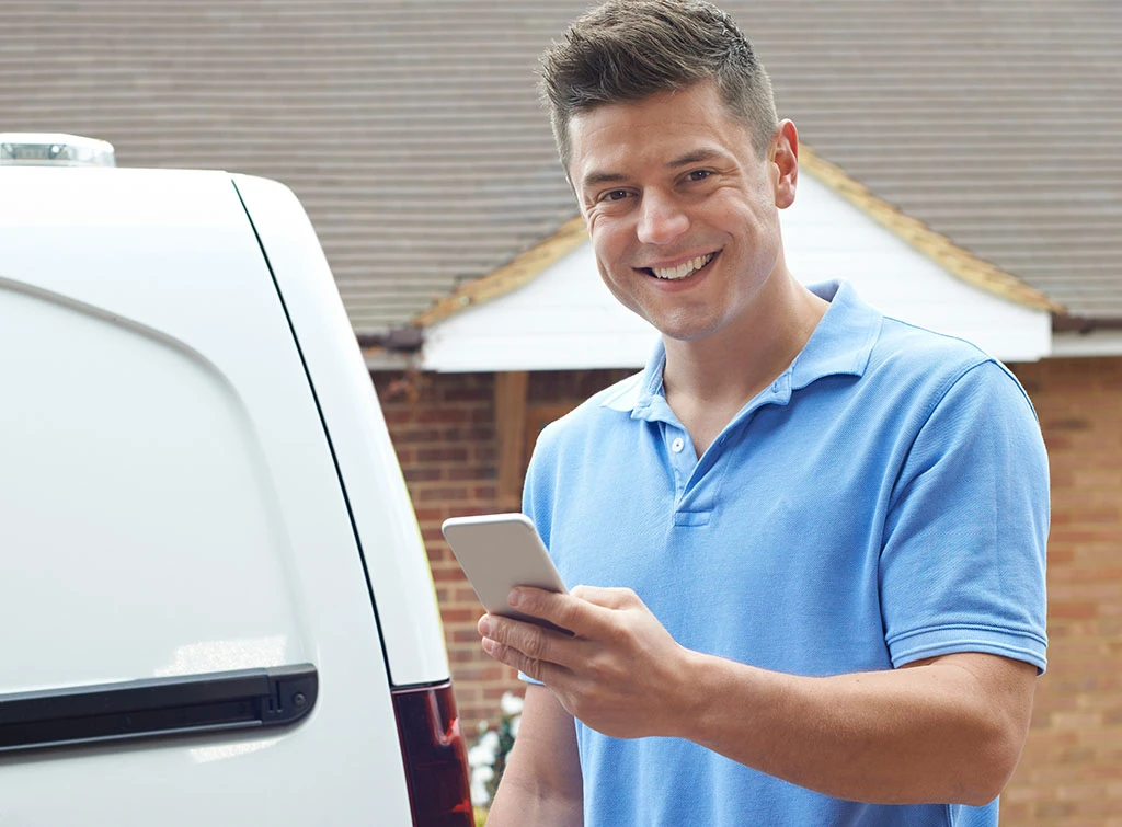 tradesperson preparing a quote for a job on the go