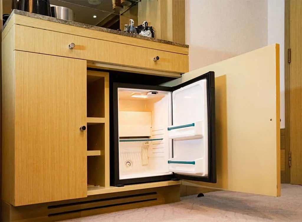 https://www.checkatrade.com/blog/wp-content/uploads/2023/07/Cupboard-mini-bar.jpg
