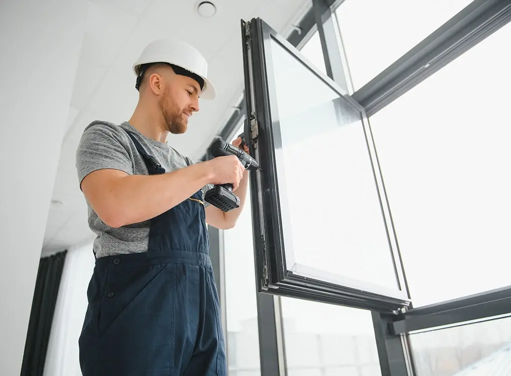https://www.checkatrade.com/blog/wp-content/uploads/2023/09/window-fitter.jpg