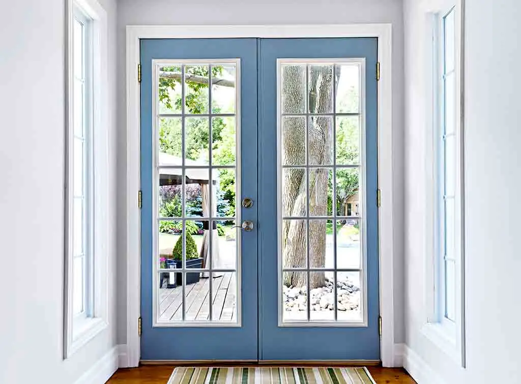 https://www.checkatrade.com/blog/wp-content/uploads/2022/03/cost-to-install-french-doors-in-brick-wall-1.jpg