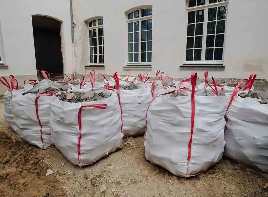 Removing rubble in bags