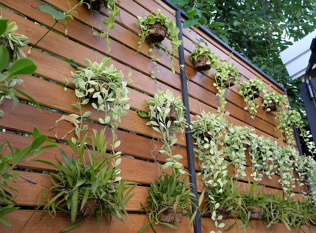 horizontal fence with planters
