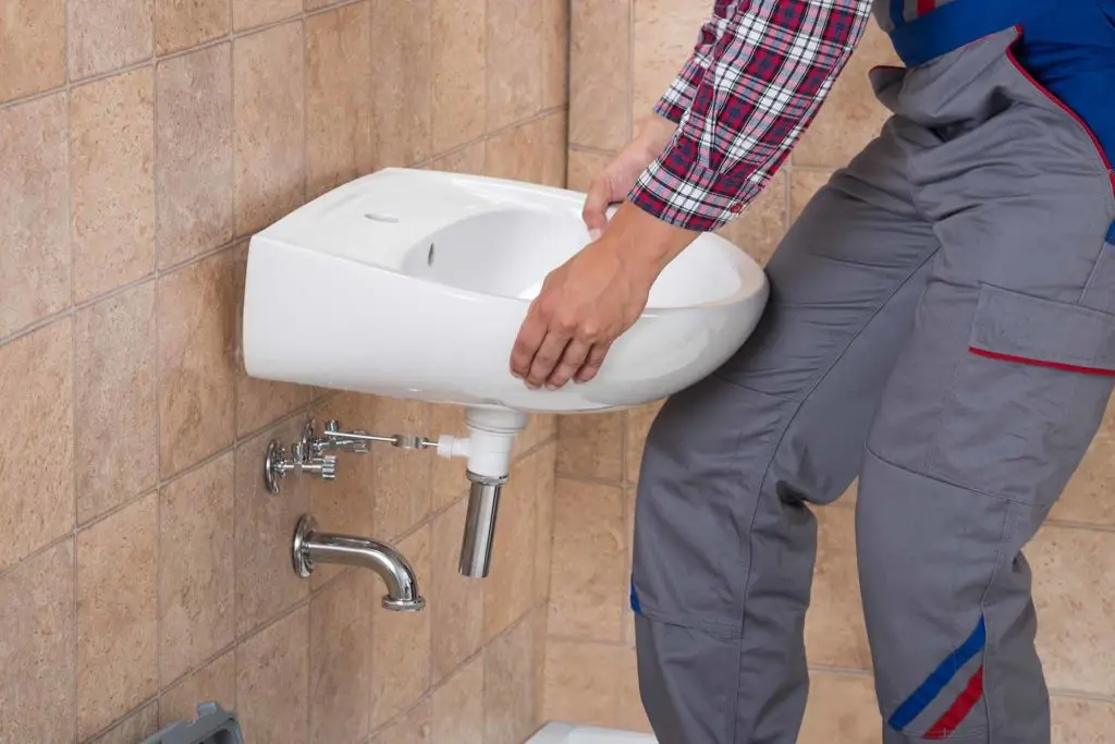 https://www.checkatrade.com/blog/wp-content/uploads/2021/10/Bathroom-Fitter-1024x683.jpg