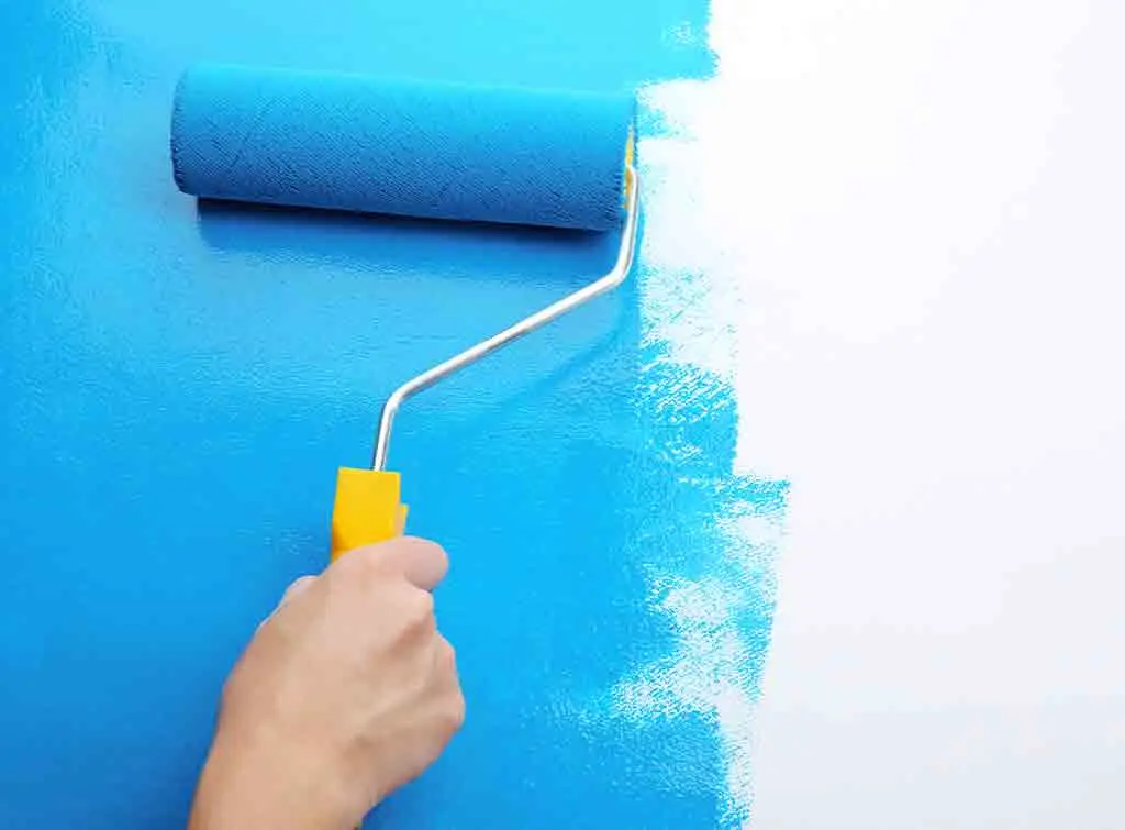 Painting a wall by hand