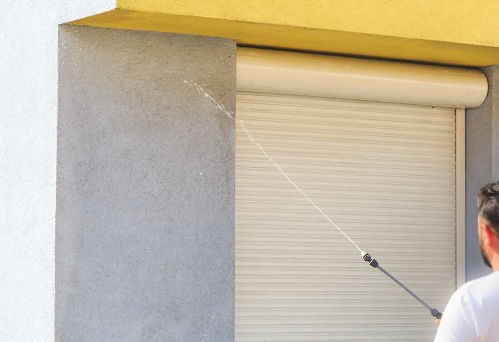 Softwashing to clean render