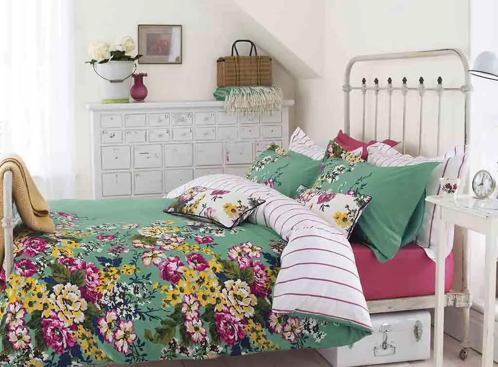 mix florals and stripes in country bedroom