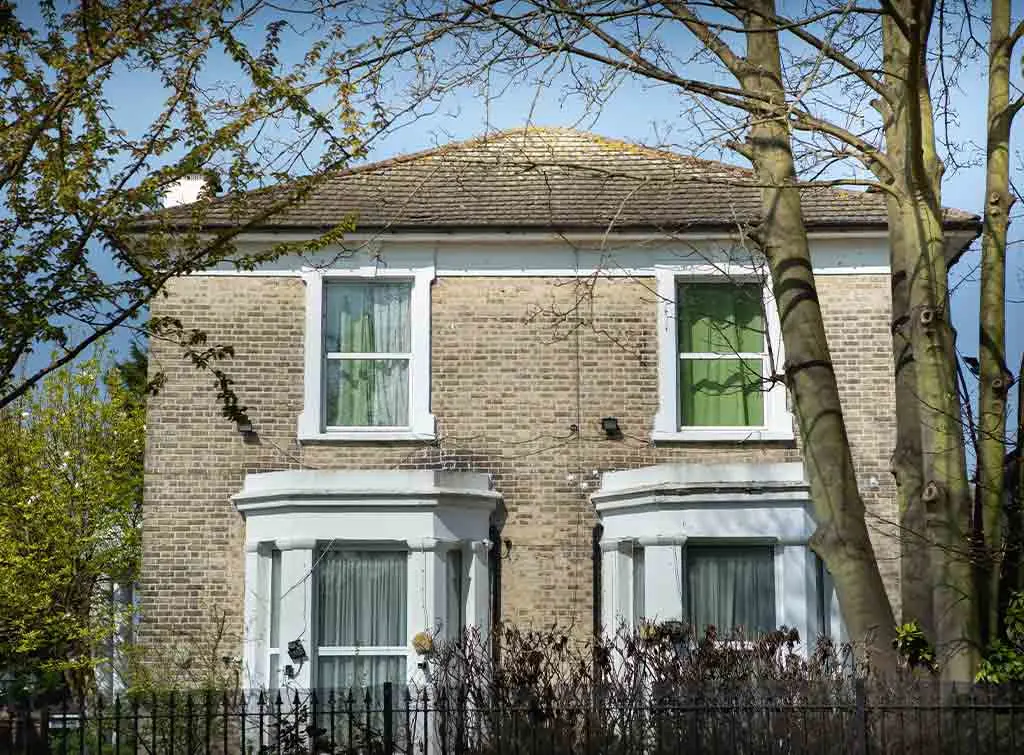 Period property with ground floor bay windows with flat roofs