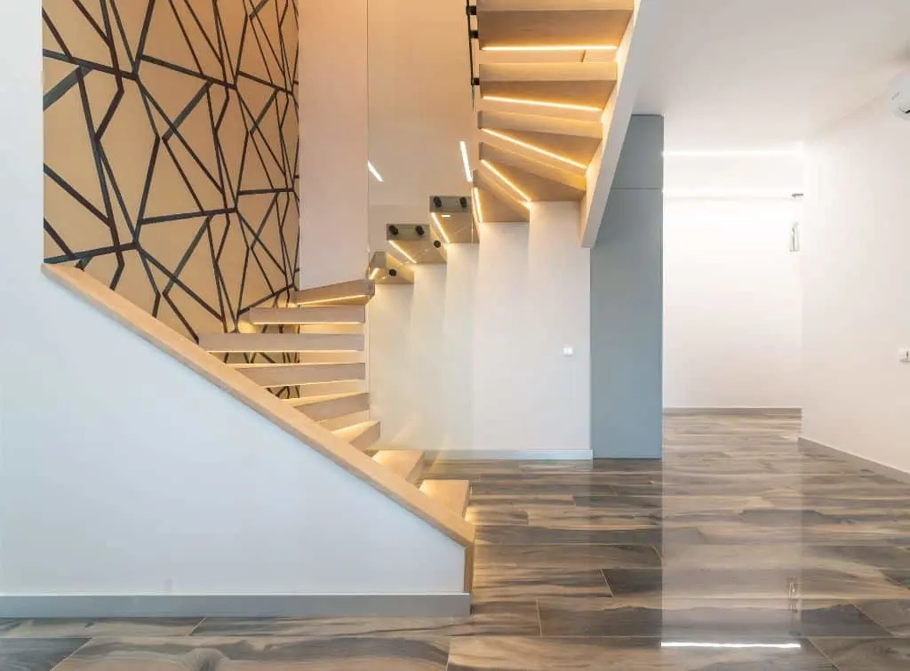 Geometric wallpaper design on enclosed staircase